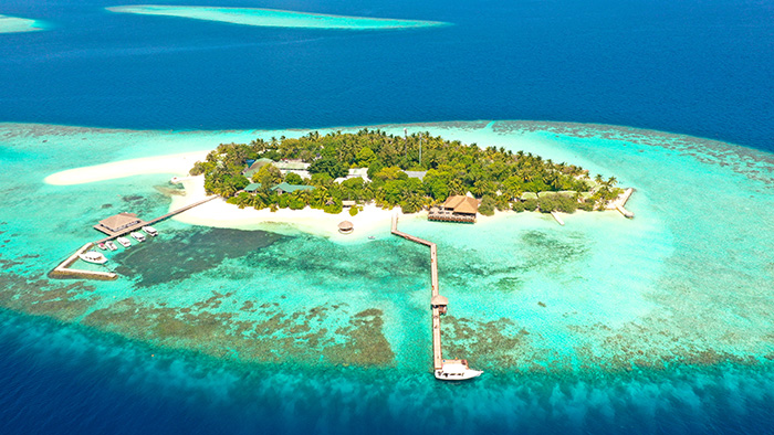 Beach villa Maldives luxury resort Eriyadu Island wedding honeymoon